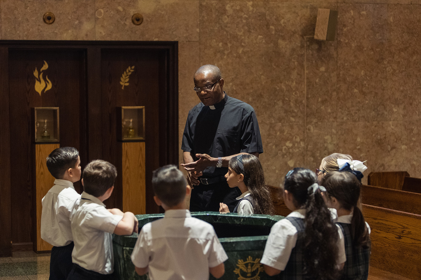 Bay Ridge Catholic students and priest